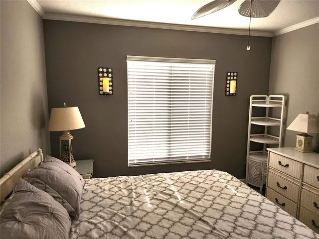 a bedroom with a bed and a closet