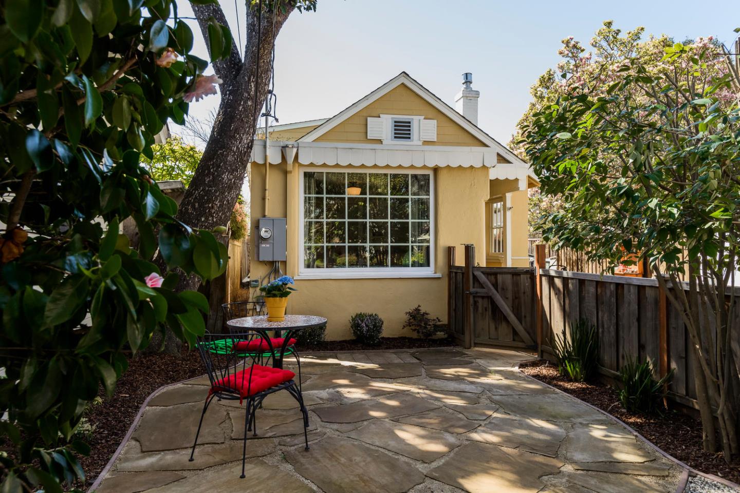 117 Dwight Road Burlingame, CA 94010 - Photo 1 of 20 a front view of a house with a yard