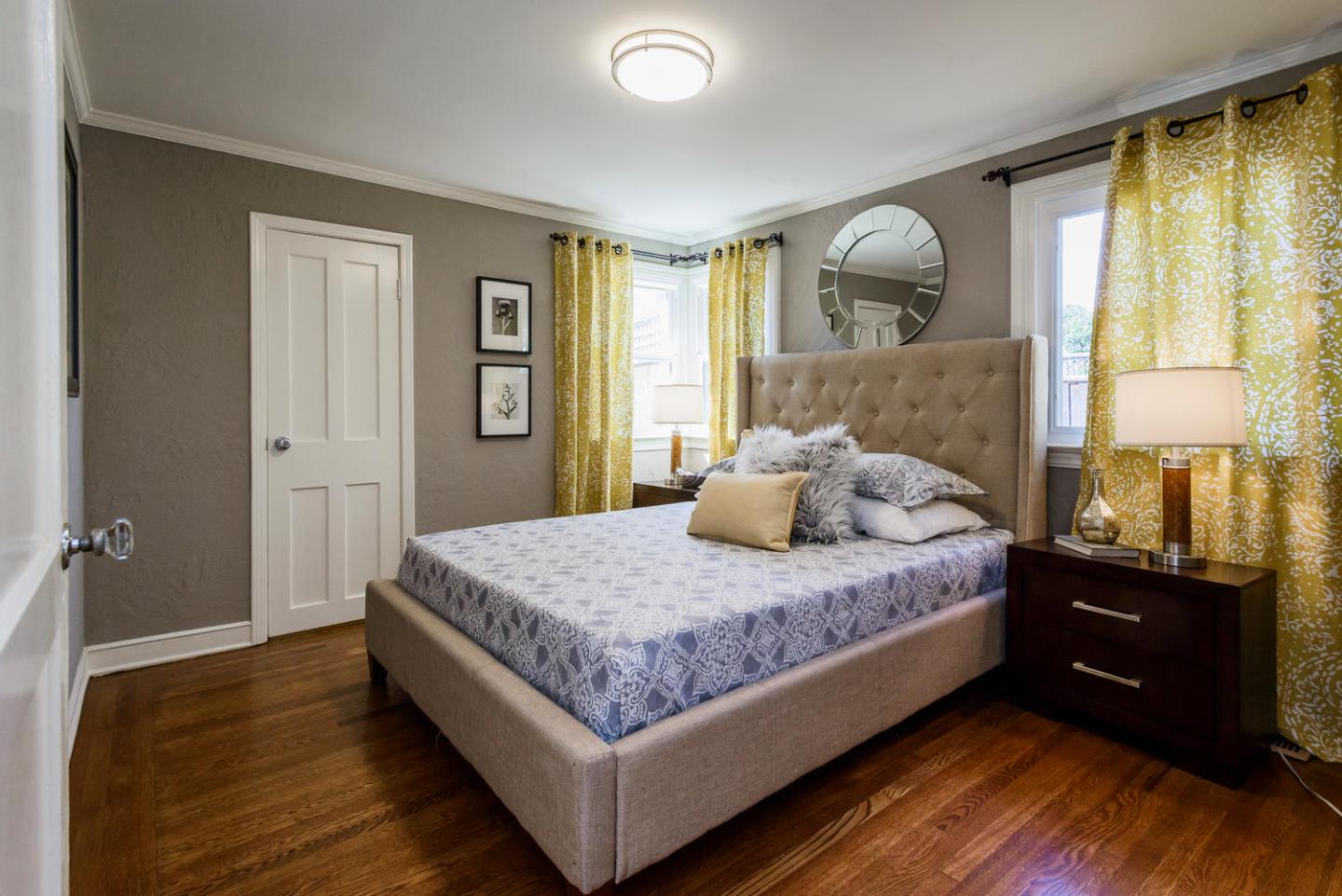 117 Dwight Road Burlingame, CA 94010 - Photo 13 of 20 a bedroom with a bed and wooden floor