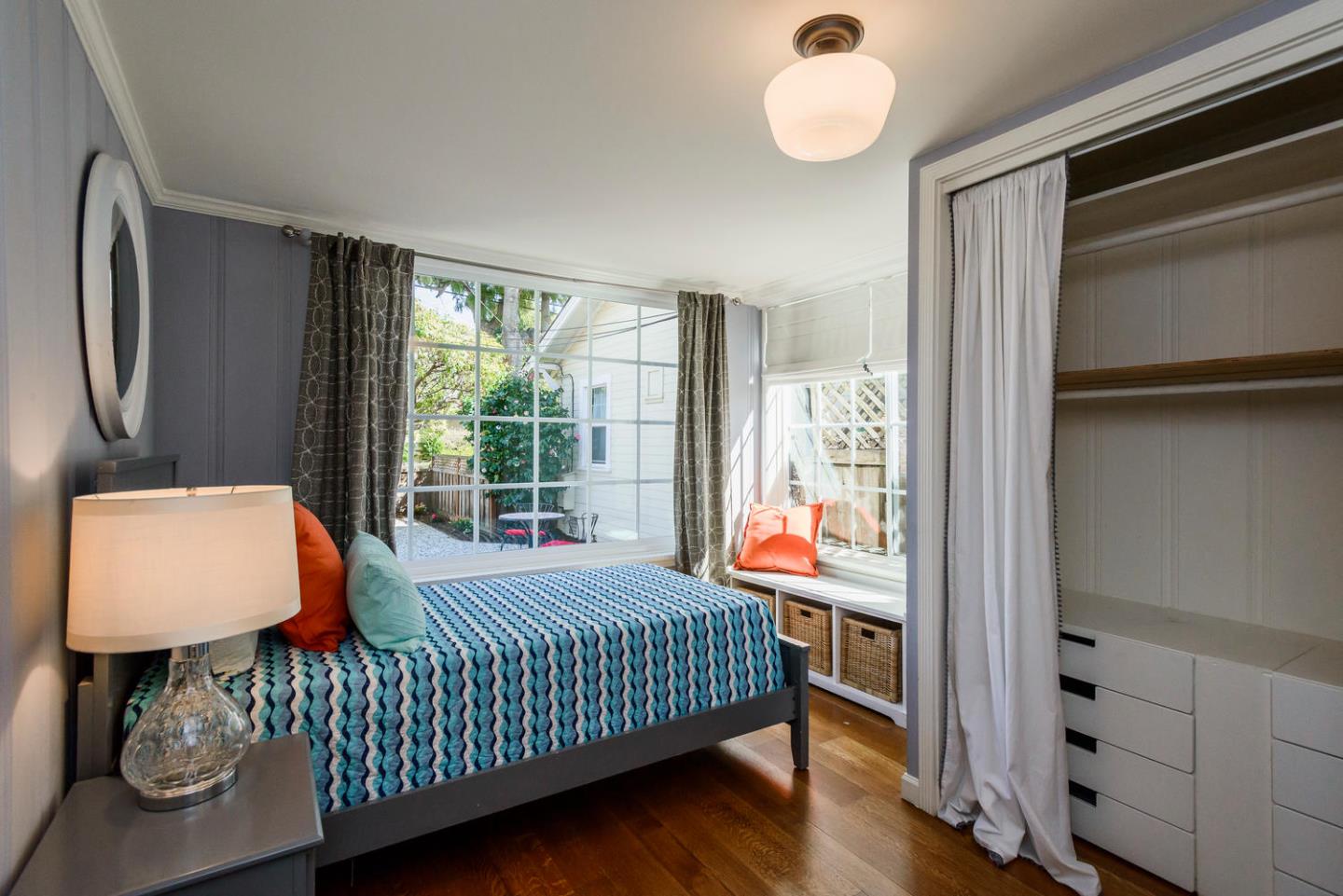 117 Dwight Road Burlingame, CA 94010 - Photo 14 of 20 a bedroom with a bed and a window
