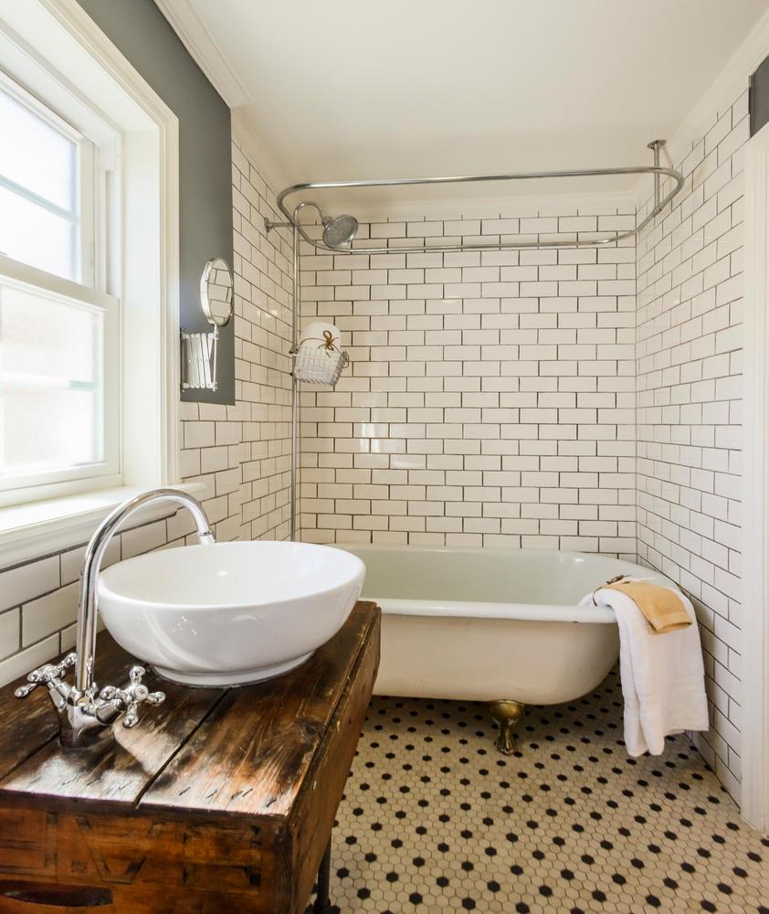 117 Dwight Road Burlingame, CA 94010 - Photo 15 of 20 a bathroom with a sink toilet and shower