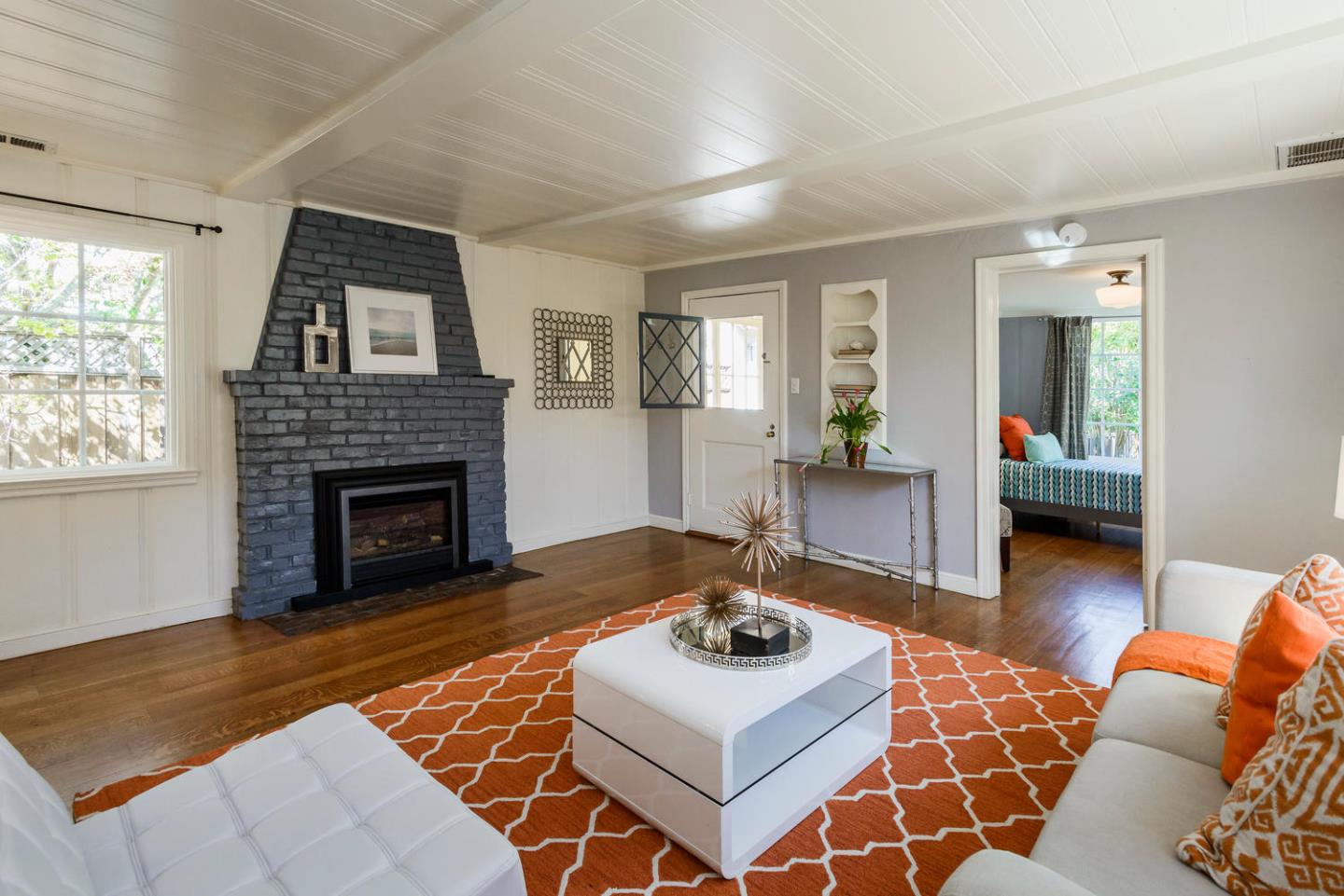 117 Dwight Road Burlingame, CA 94010 - Photo 8 of 20 a living room with furniture and a fireplace