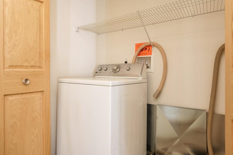 4585 South Chana Road Chana, IL 61015 - Photo 16 of 76 a utility room with dryer and washer