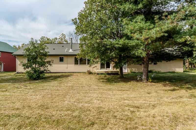 4585 South Chana Road Chana, IL 61015 - Photo 35 of 76 a front view of a house with a yard