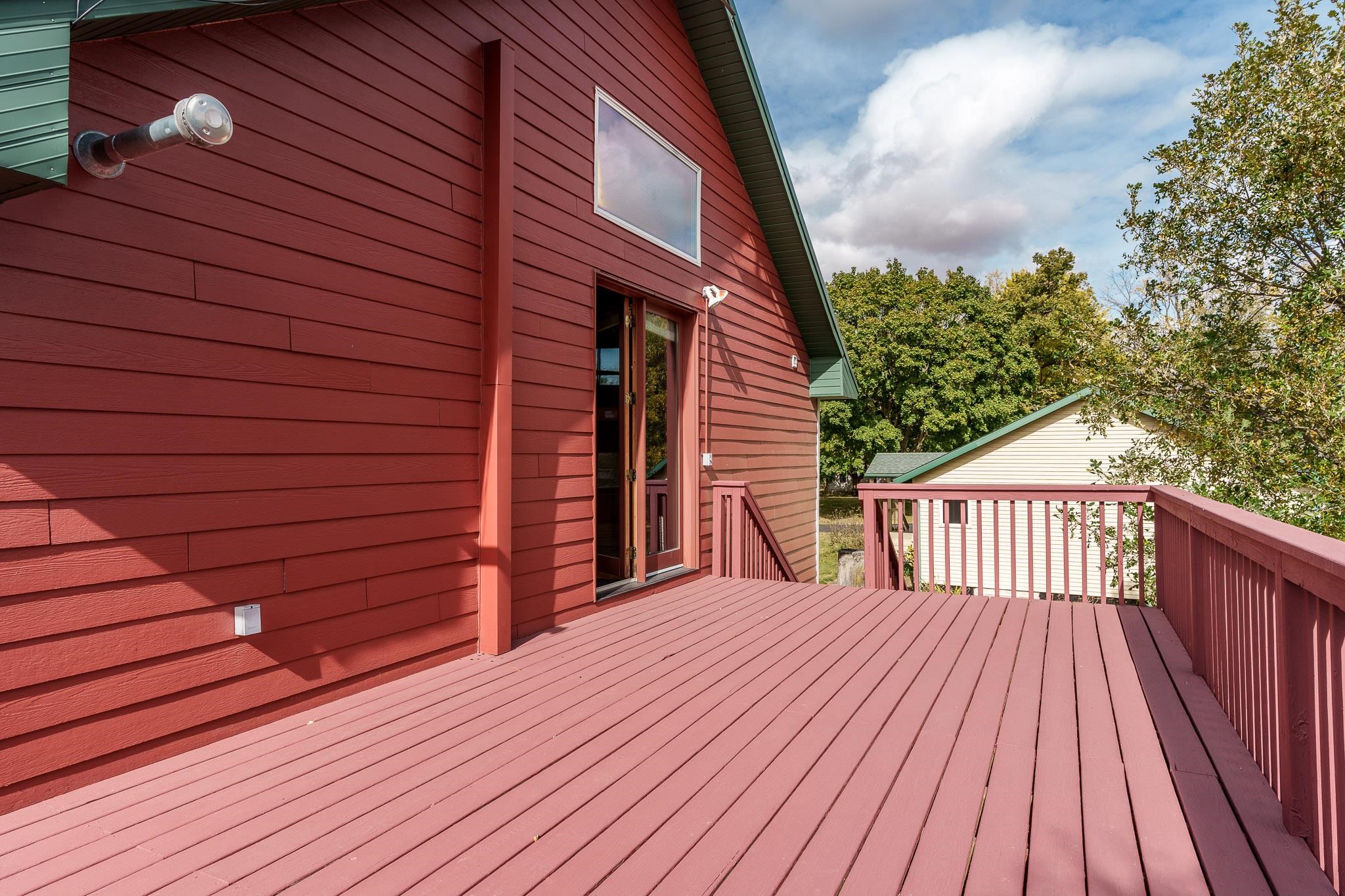 4585 South Chana Road Chana, IL 61015 - Photo 39 of 76 a view of a wooden deck