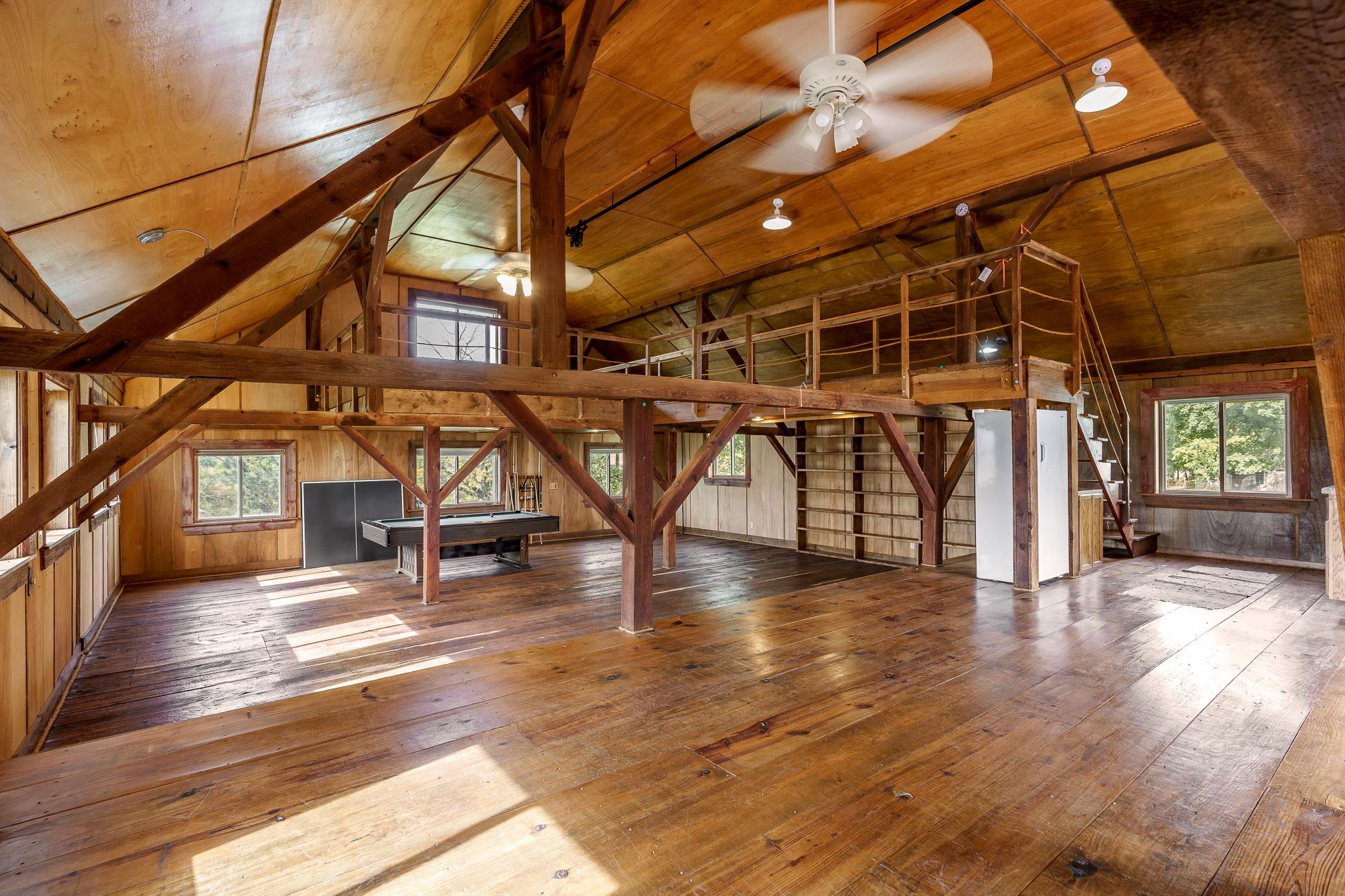 4585 South Chana Road Chana, IL 61015 - Photo 41 of 76 a view of a hall with wooden floor