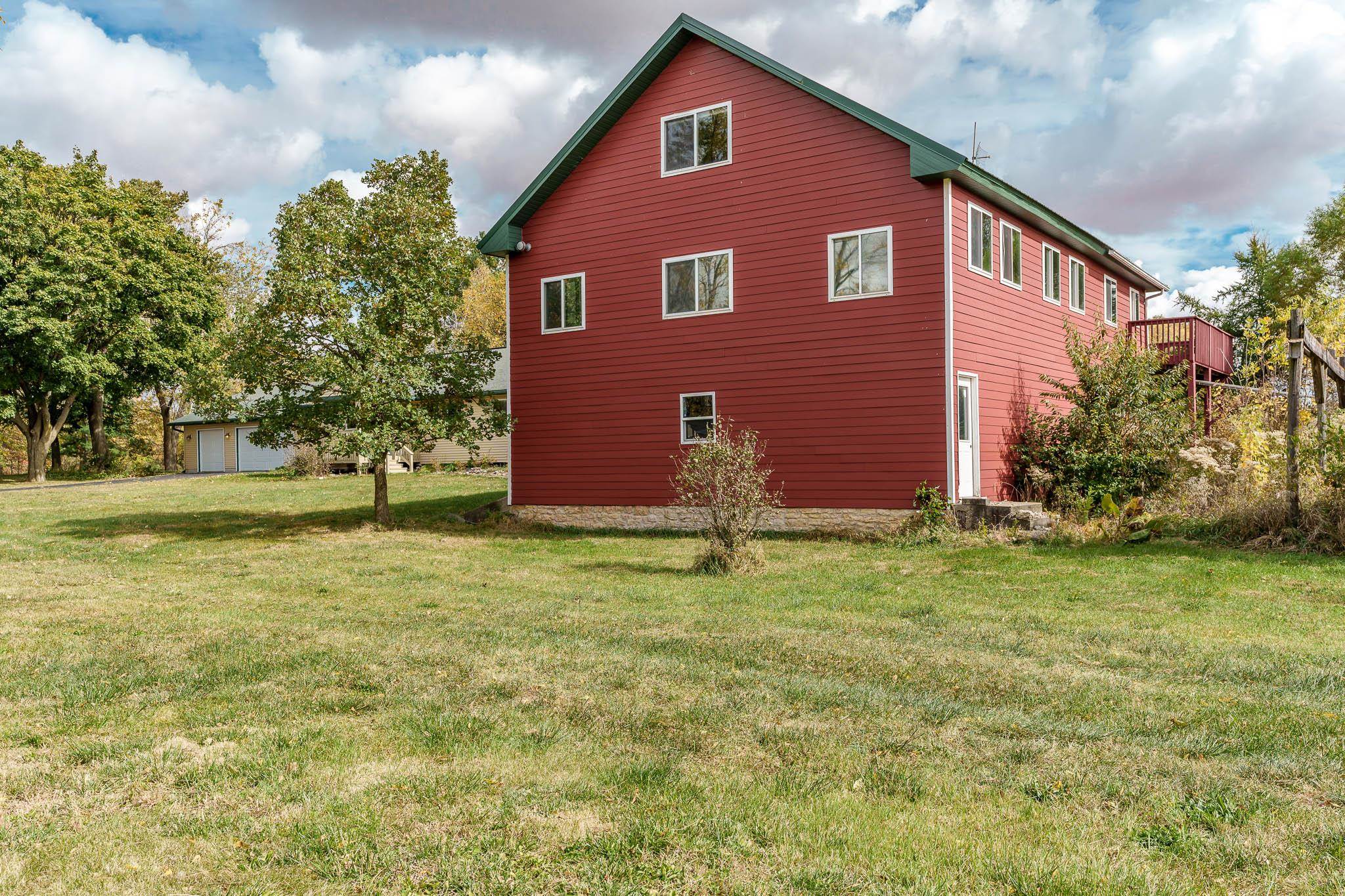 4585 South Chana Road Chana, IL 61015 - Photo 50 of 76 a front view of a house with garden