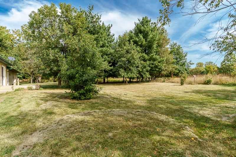 4585 South Chana Road Chana, IL 61015 - Photo 57 of 76 a view of yard with tree