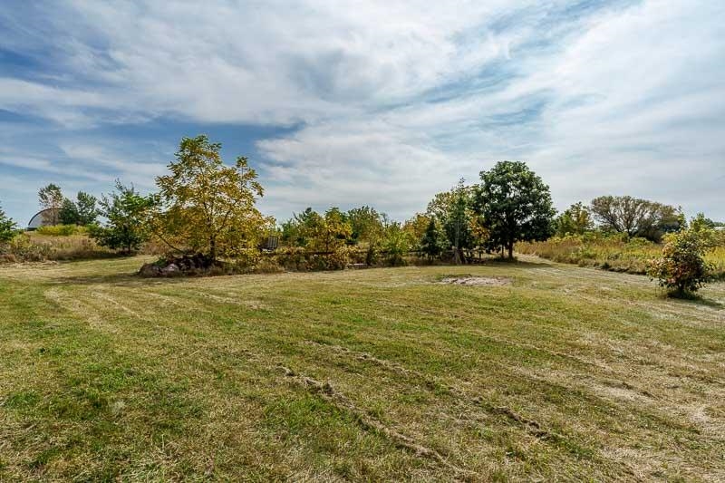 4585 South Chana Road Chana, IL 61015 - Photo 58 of 76 a view of a field with an trees