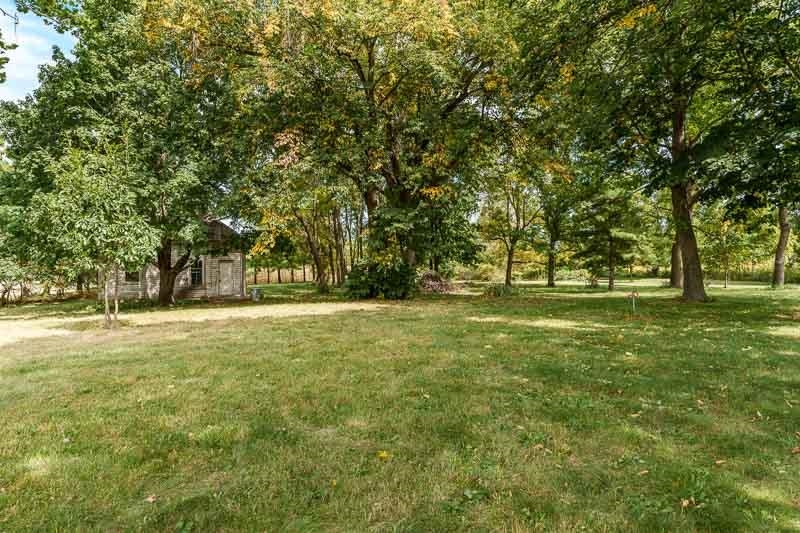 4585 South Chana Road Chana, IL 61015 - Photo 59 of 76 a view of outdoor space with trees all around