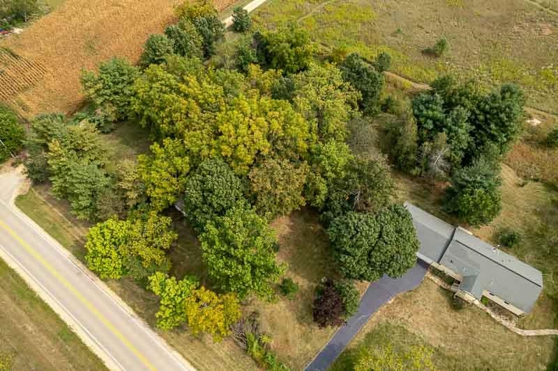 4585 South Chana Road Chana, IL 61015 - Photo 62 of 76 a view of a forest from a balcony