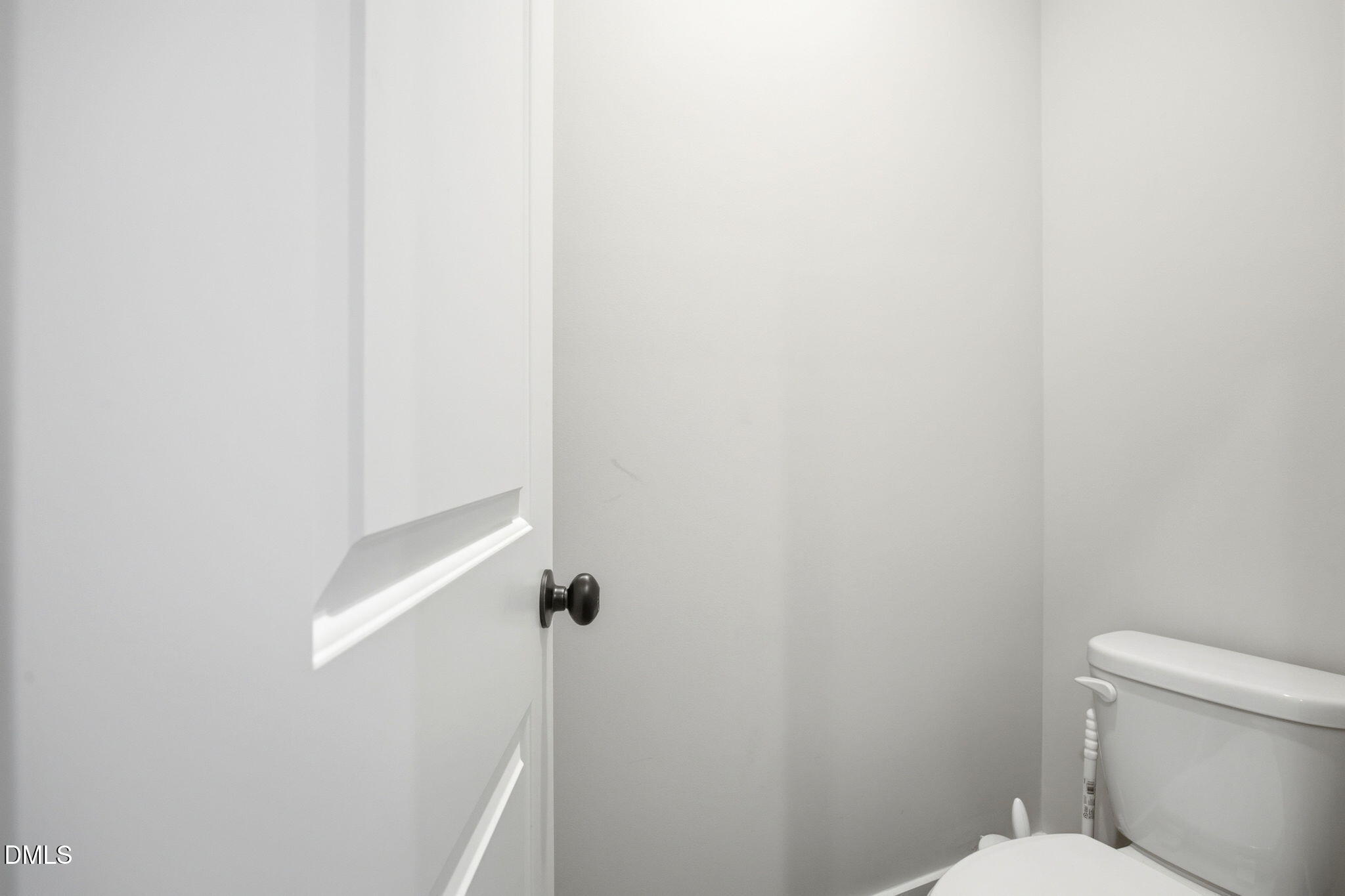 3511 Bruce Garner Road Wake Forest, NC 27587 - Photo 23 of 56 a white toilet sitting next to a white wall