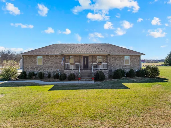 a house view with swimming pool in front of it