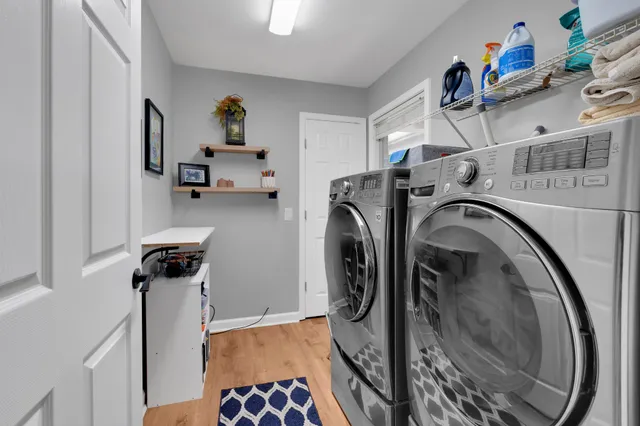 a view of storage and utility room with washer and dryer