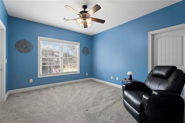 a view of workspace with lounge chair