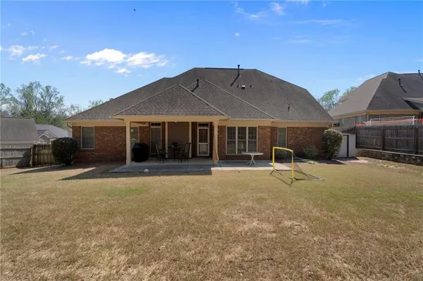 a house view with a garden space