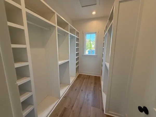a view of entryway with wooden floor