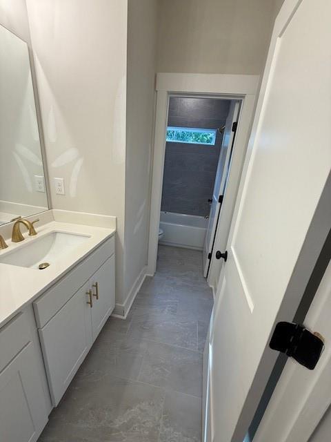 5648 Meadow View Drive Jefferson, GA 30549 - Photo 20 of 31 a bathroom with a double vanity sink and mirror with toilet