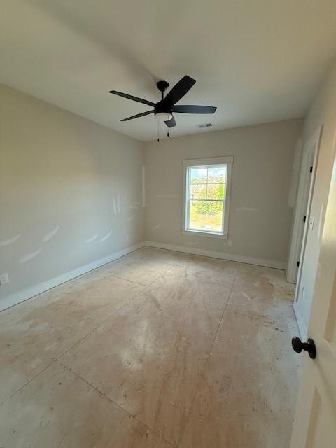 5648 Meadow View Drive Jefferson, GA 30549 - Photo 23 of 31 an empty room with windows and fan