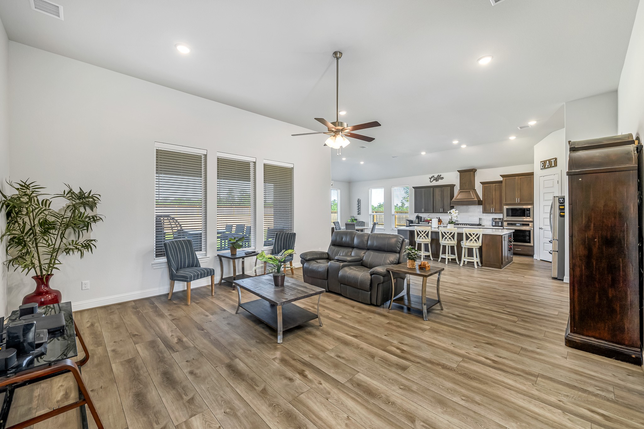 41015 Kimber Lane Magnolia, TX 77354 - Photo 15 of 44 a living room with furniture and a large window
