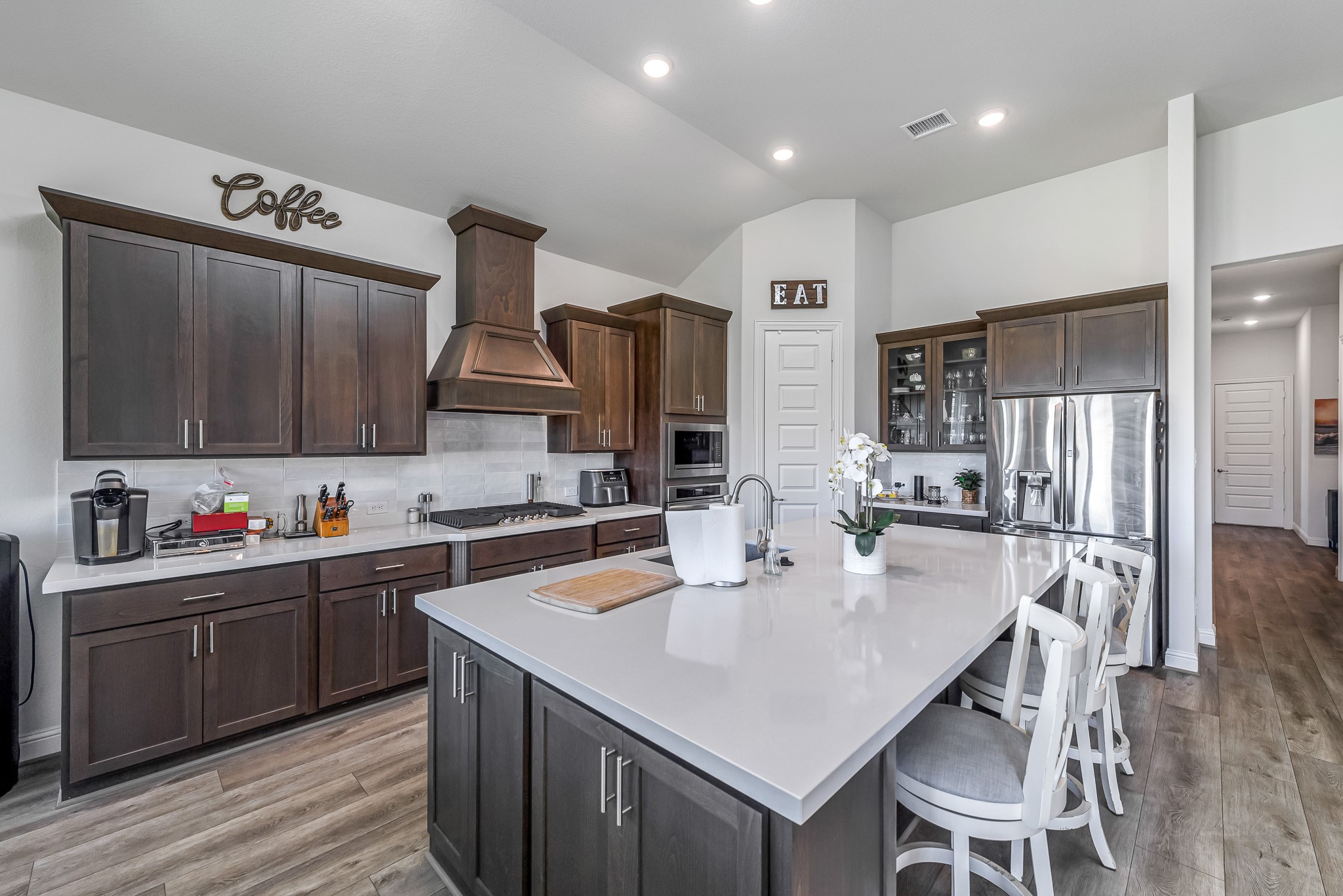 41015 Kimber Lane Magnolia, TX 77354 - Photo 19 of 44 a kitchen with granite countertop a sink and cabinets