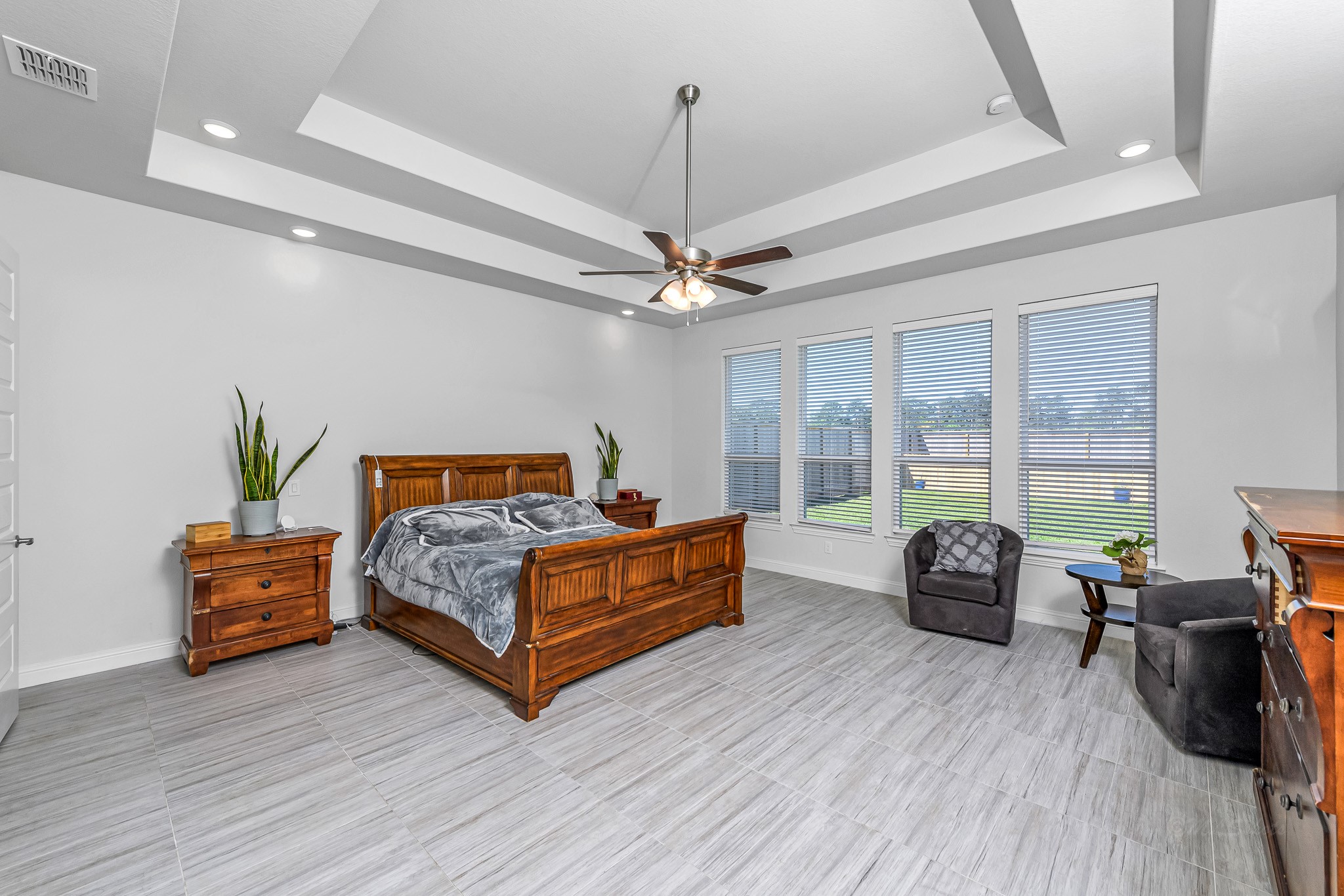 41015 Kimber Lane Magnolia, TX 77354 - Photo 23 of 44 a bedroom with furniture and wooden floor