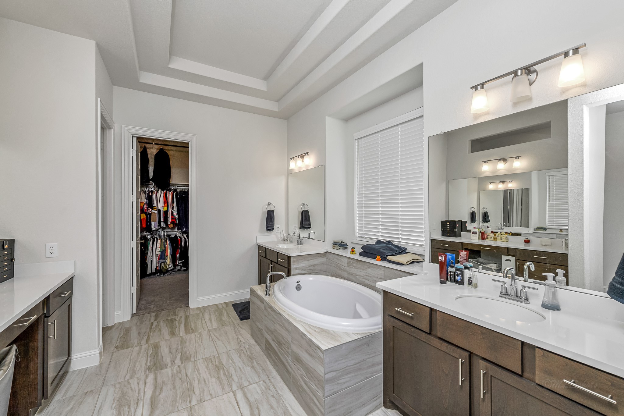 41015 Kimber Lane Magnolia, TX 77354 - Photo 24 of 44 a bathroom with a sink double vanity