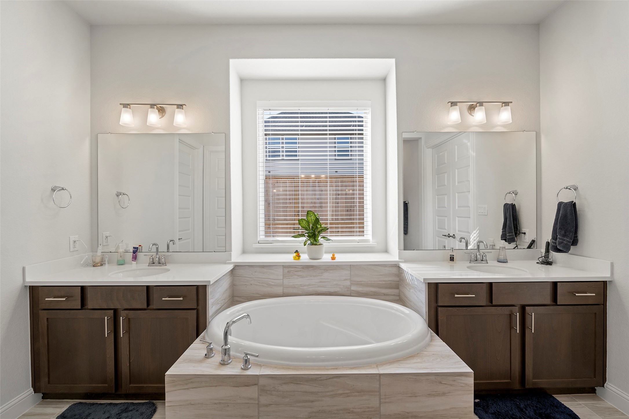 41015 Kimber Lane Magnolia, TX 77354 - Photo 25 of 44 a bath tub sitting next to a bathroom sink