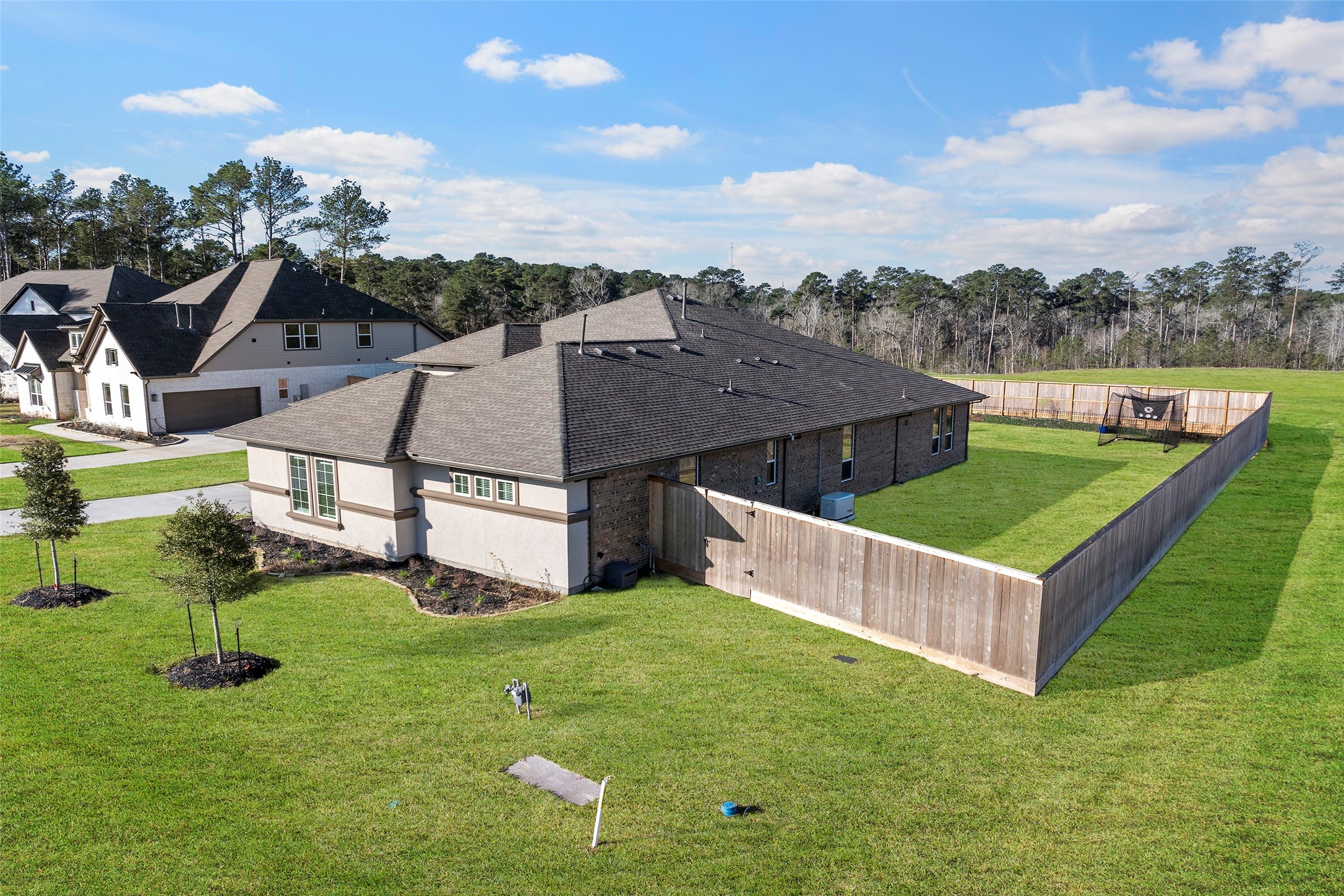 41015 Kimber Lane Magnolia, TX 77354 - Photo 7 of 44 an aerial view of a house