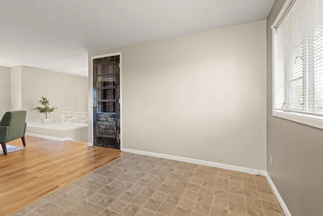 a view of livingroom with furniture and window