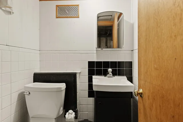 a bathroom with a sink and a toilet