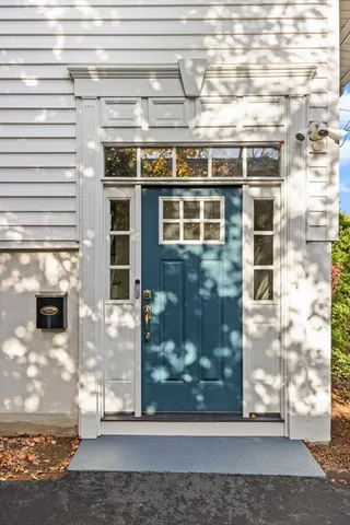 a view of a glass door with glass windows