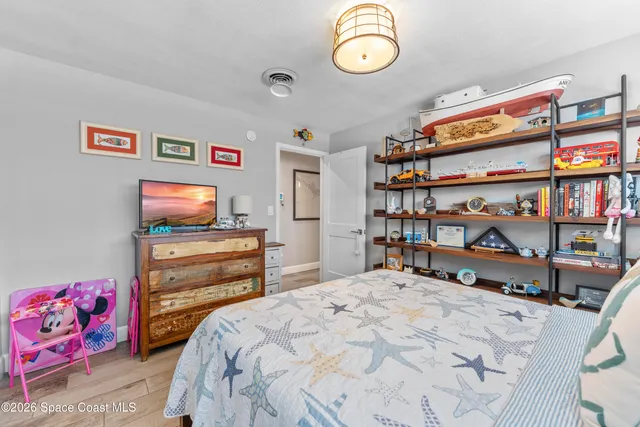 a bathroom with a sink double vanity and a mirror
