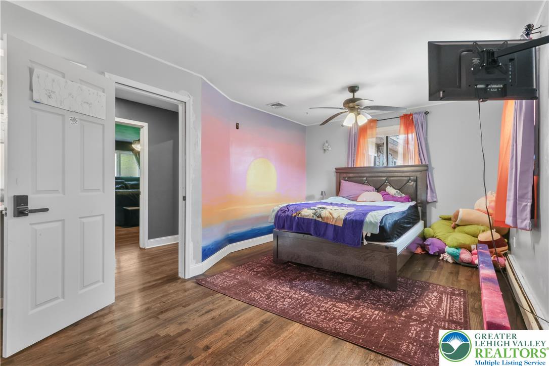 1042 Neffs Laurys Road Laurys Station, PA 18059 - Photo 24 of 27 a bedroom with a bed and a view of kitchen