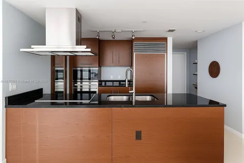 a view of a living room with furniture