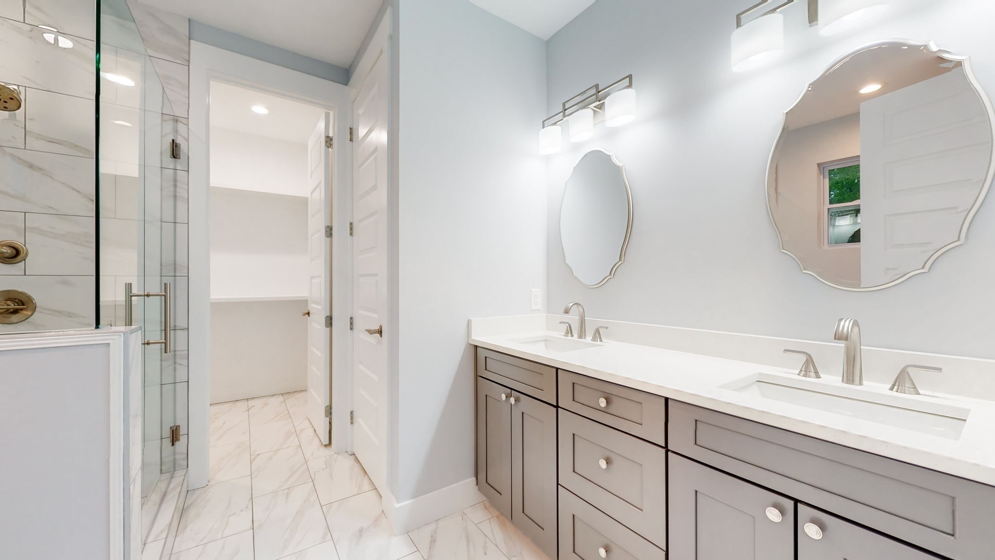 128 Ben Allen Road Nashville, TN 37207 - Photo 24 of 51 a bathroom with a double vanity sink mirror and shower