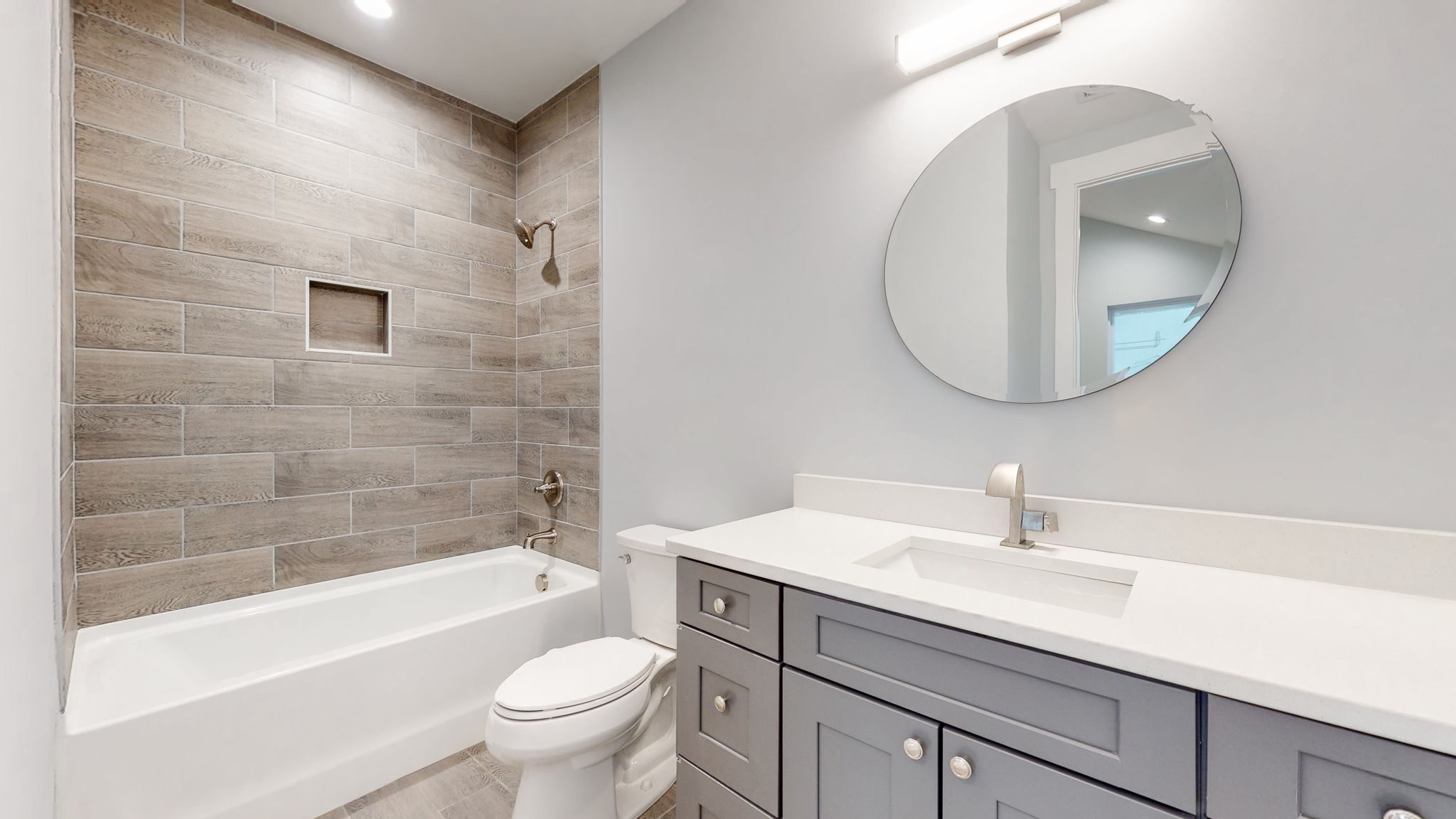128 Ben Allen Road Nashville, TN 37207 - Photo 30 of 51 a bathroom with a sink a toilet and a mirror