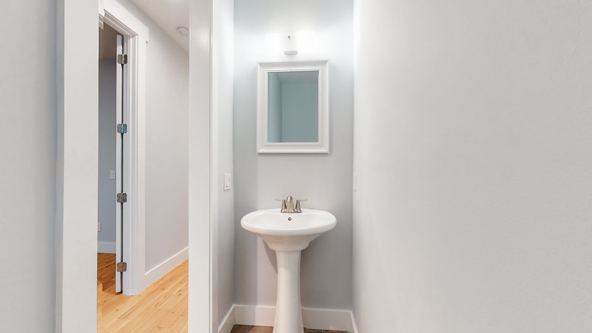 128 Ben Allen Road Nashville, TN 37207 - Photo 32 of 51 a bathroom with a sink and a mirror