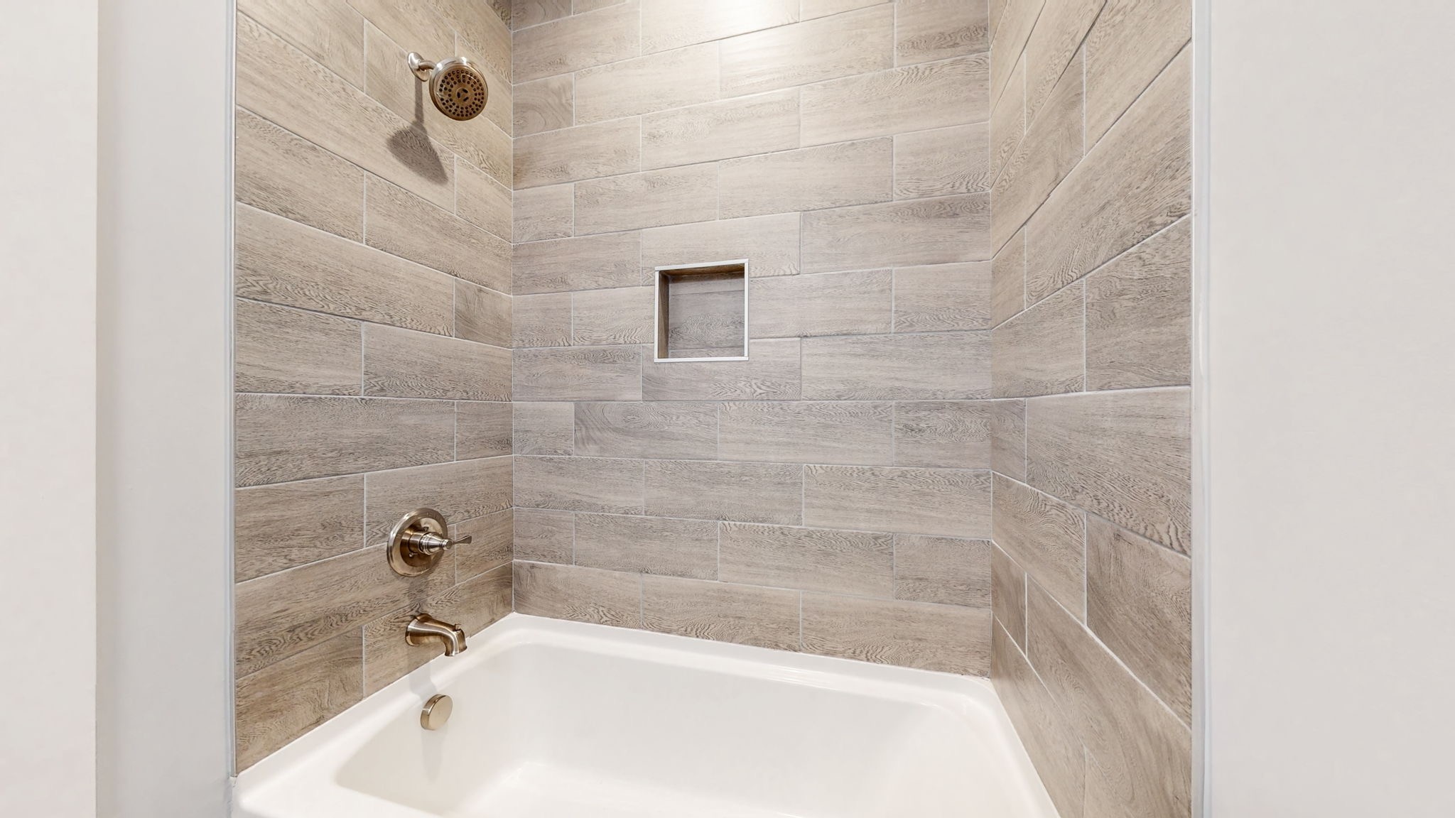 128 Ben Allen Road Nashville, TN 37207 - Photo 36 of 51 a bath tub sitting next to a white sink and a shower