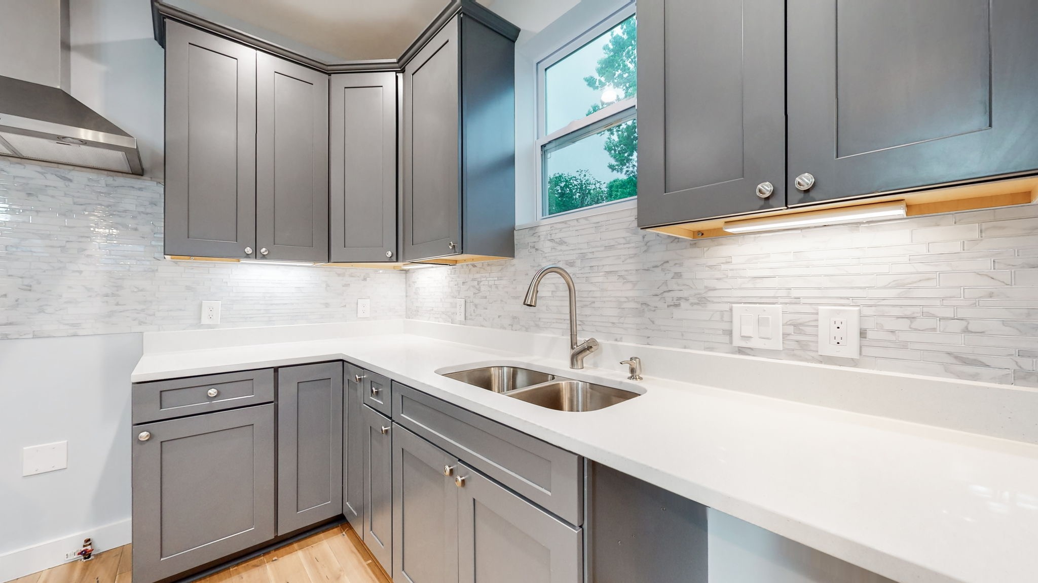 128 Ben Allen Road Nashville, TN 37207 - Photo 5 of 51 a kitchen with a sink and cabinets
