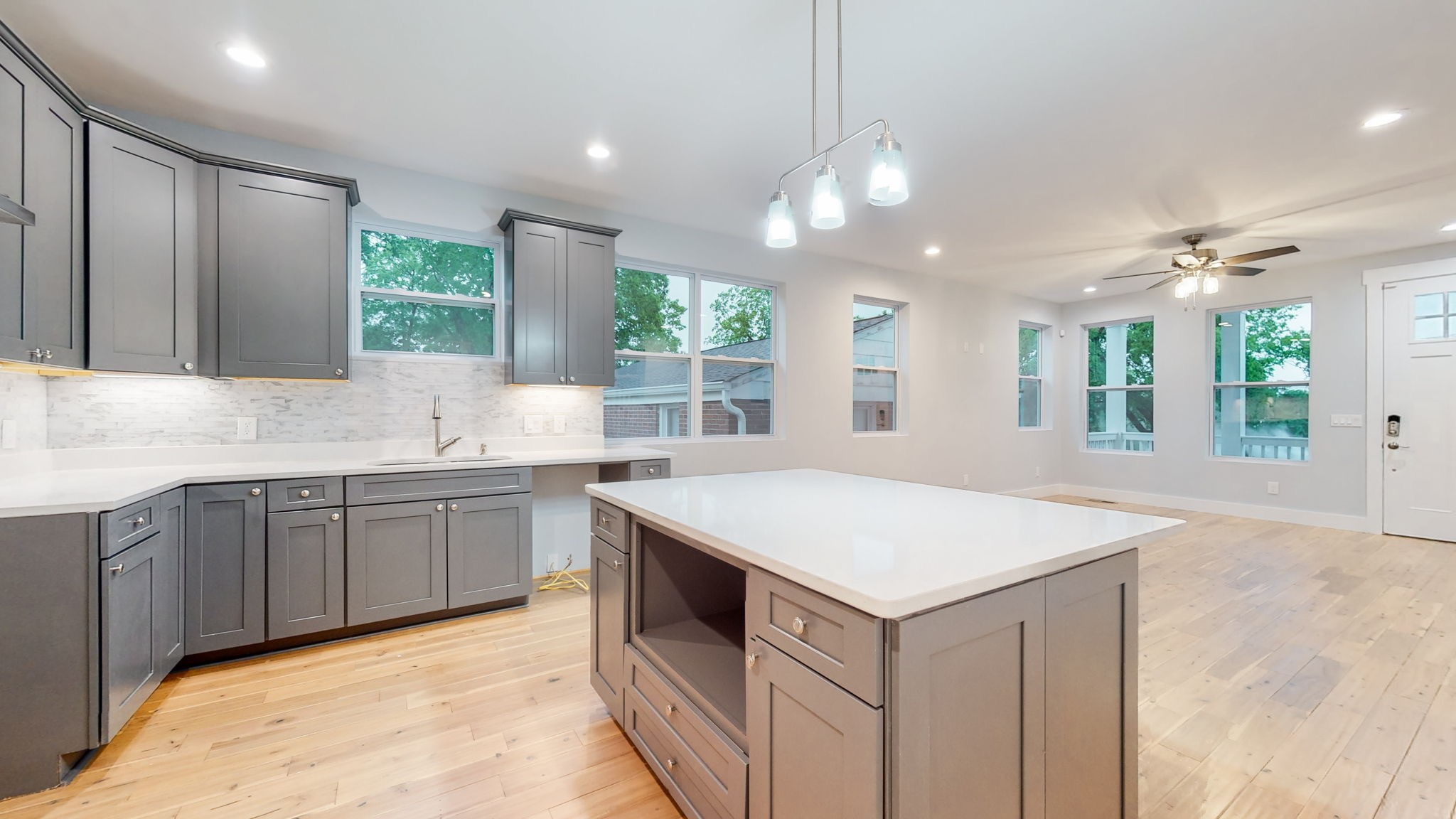128 Ben Allen Road Nashville, TN 37207 - Photo 6 of 51 a kitchen with a stove cabinets and wooden floor