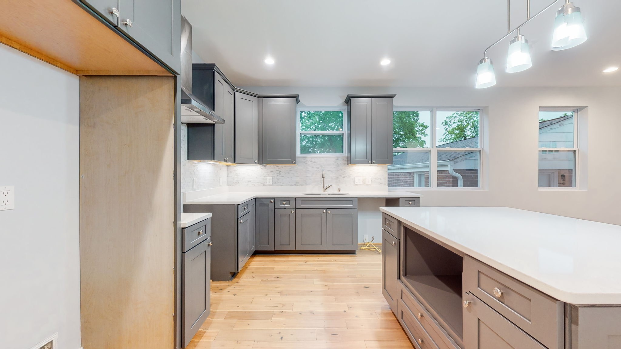 128 Ben Allen Road Nashville, TN 37207 - Photo 10 of 51 a kitchen with a sink stove and cabinets