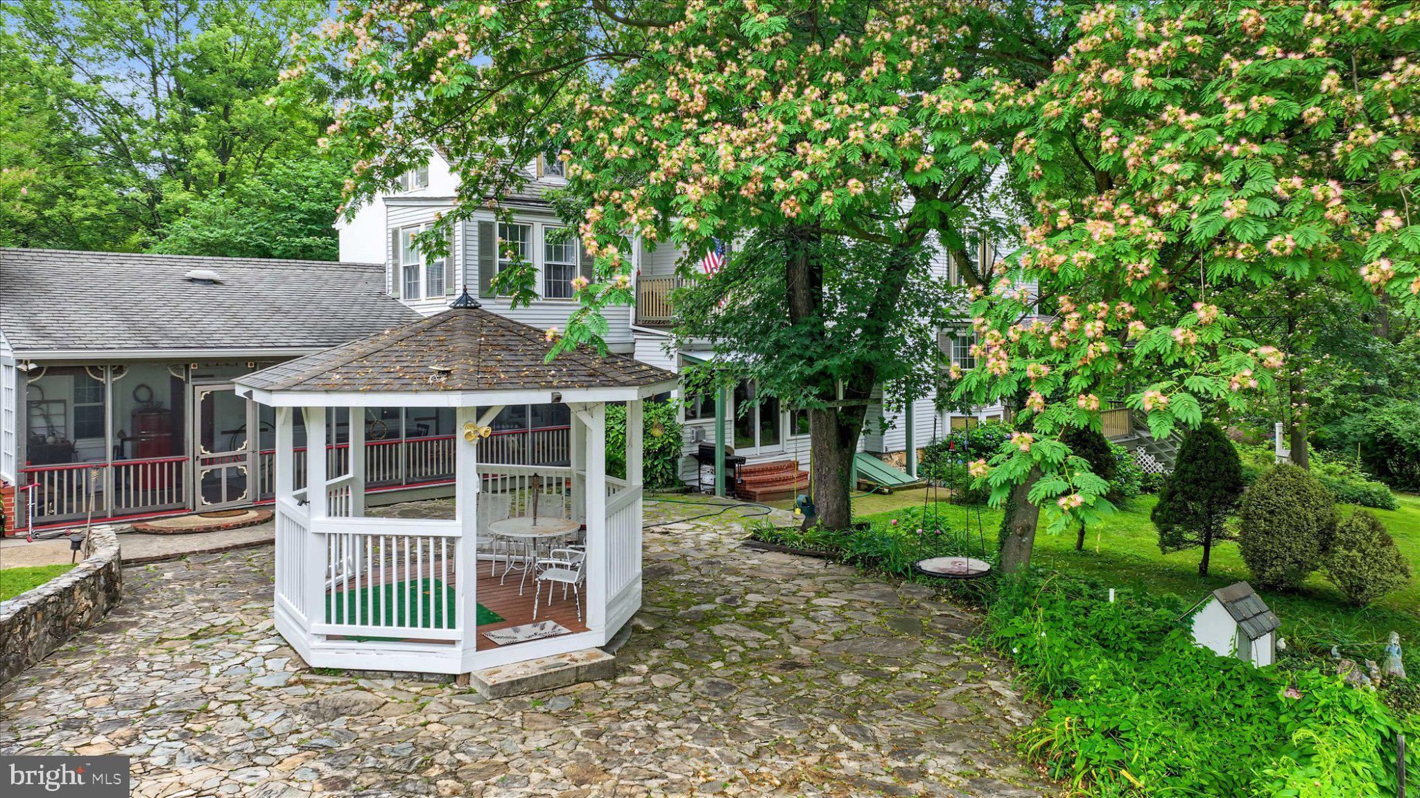 6739 South Clifton Road Frederick, MD 21703 - Photo 45 of 53 Charming gazebo amid lush greenery.