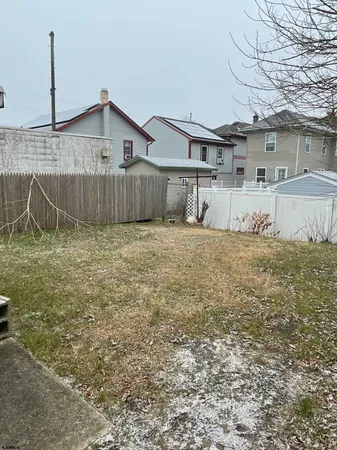 a view of a house with a street