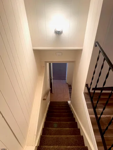 a bathroom with a sink a toilet and tub