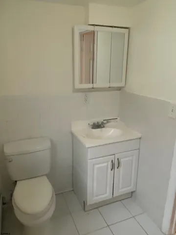 a bathroom with a shower and a bath tub