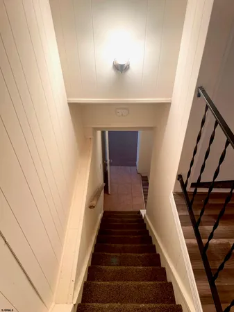 a bathroom with a sink a toilet and tub