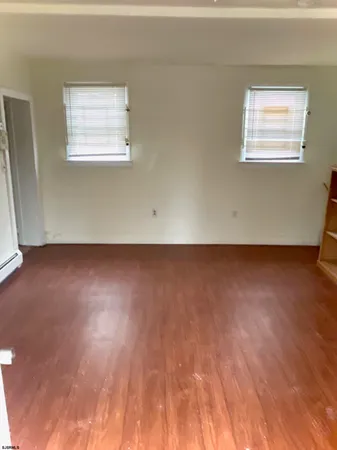 an empty room with an empty room