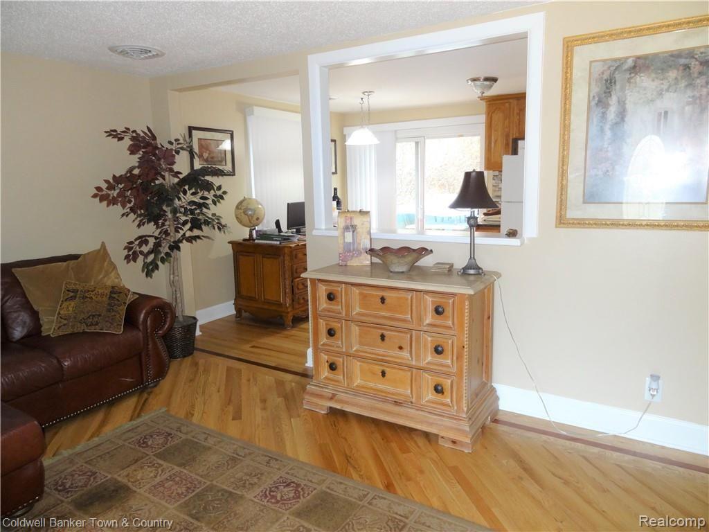 223 Ruppert Street Commerce Township, MI 48382 - Photo 8 of 31 Living room to kitchen.