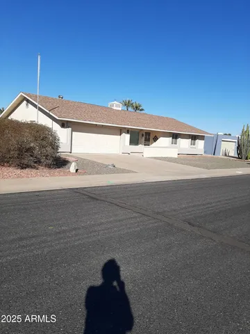 a view of a big room with a window